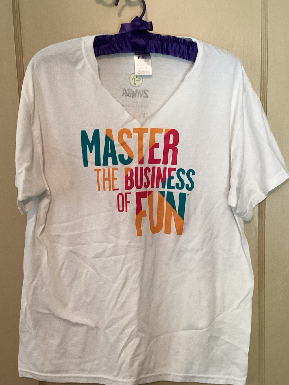 Zumba Fitness White Graphic Tee - Master the Business of Fun